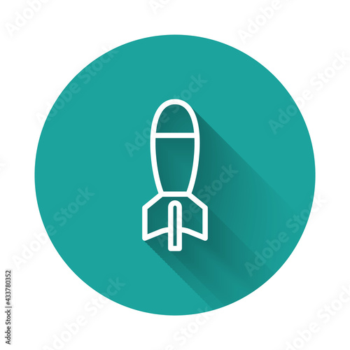 White line Rocket launcher with missile icon isolated with long shadow background. Green circle button. Vector