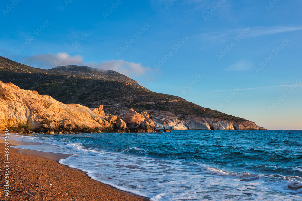 Agios Ioannis beach on sunset. Milos island, Greece