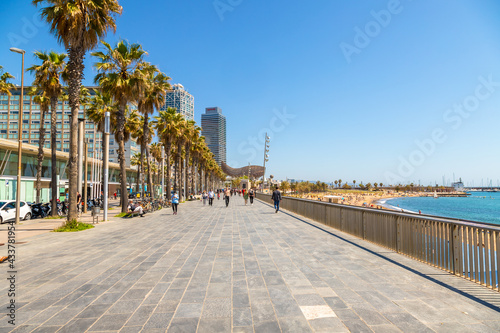 Photography Picture of Barceloneta seafront promenade captured during a sunny day