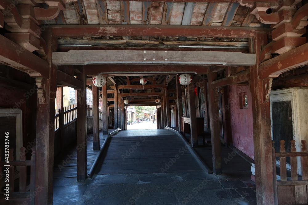 Hoi An, Vietnam, May 15, 2021: Wooden interior passageway of the Japanese Bridge in Hoi An, Vietnam. One of the most emblematic monuments of the city