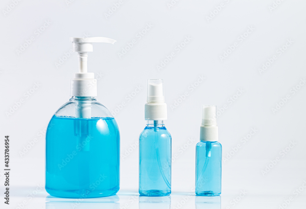 Plastic dispenser sanitizer alcohol gel pump and spray bottle for washing hand hygiene prevention of coronavirus virus studio shot on white background Plastic dispenser sanitizer alcohol gel pump and spray bottle for washing hand hygiene prevention of coronavirus virus studio shot on white background