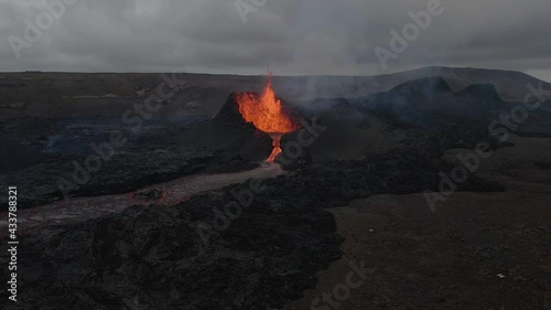 Spectacular volcano eruption near Fagradalsfjall in Iceland and landscape in background. Aerial  photo