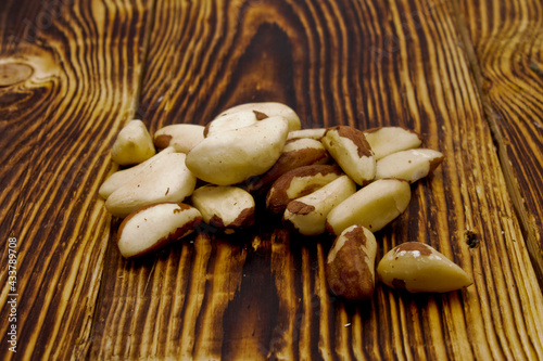 brazil nuts on a wooden tray photo