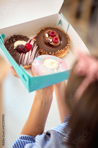 Closeup of fresh donuts ready for transport