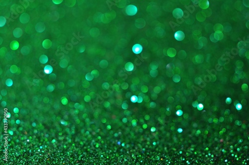 Abstract green bokeh glitter on nature background