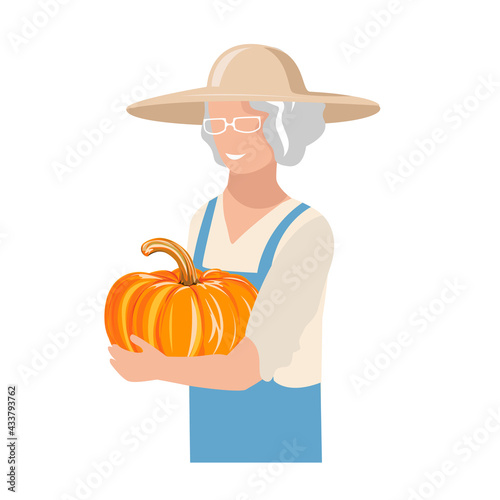 An elderly woman in work clothes and a sun hat harvests a pumpkin. Autumn harvest vector illustration on white background for krta, flyer or poster photo