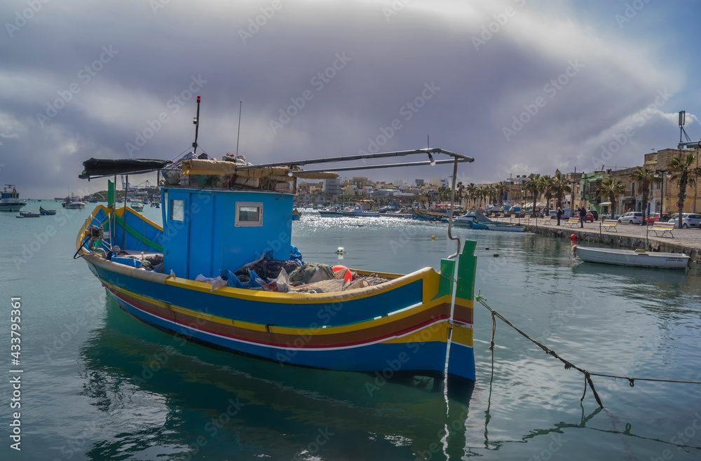 Marsaxlokk Fishermen Village In Malta. Traditional Colorful Boats At The Port Of Mars