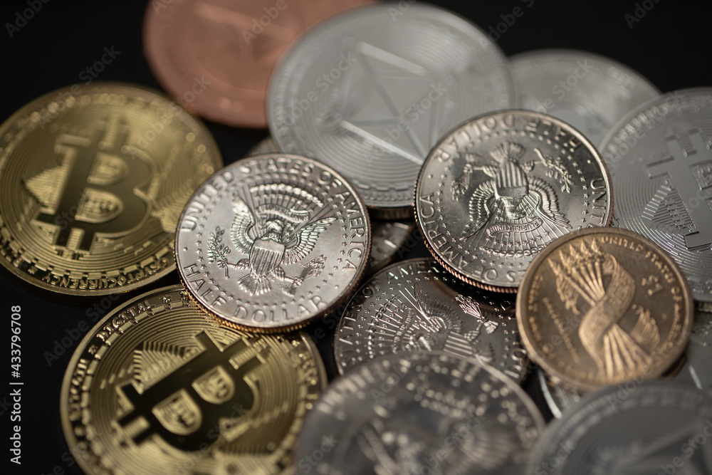 Bitcoins and Dollar coins piled up. USD currency with Digital Crypto currency. Blockchain Technology, future of trading Bitcoins and Dollar coins piled up. USD currency with Digital Crypto currency. Blockchain Technology, future of trading