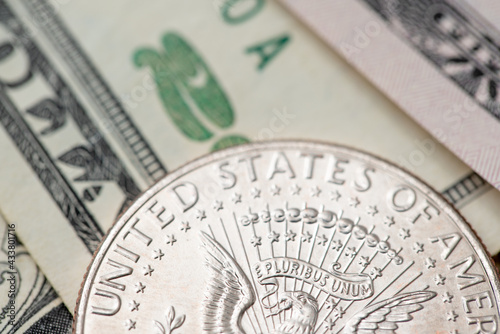 Half Dollar coin on twenty Dollar banknote. United States of America Half Dollar. US Currency and Money. Commerce and Investment in USA