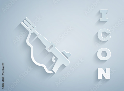 Paper cut Fishing harpoon icon isolated on grey background. Fishery manufacturers for catching fish under water. Diving underwater equipment. Paper art style. Vector