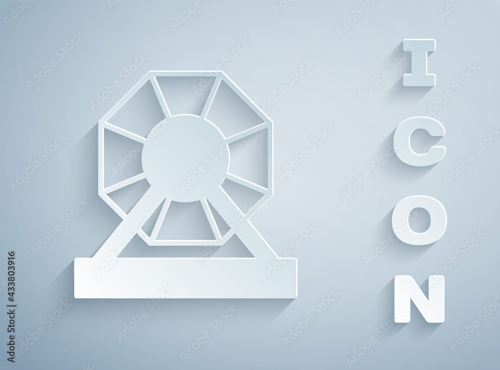 Paper cut Lottery machine icon isolated on grey background. Lotto bingo game of luck concept. Wheel drum leisure. Paper art style. Vector