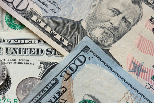 Dollar banknotes spread out. One dollar to one hundred dollar banknotes. Background with US dollar banknotes. Cash 100 and fifty dollar bills