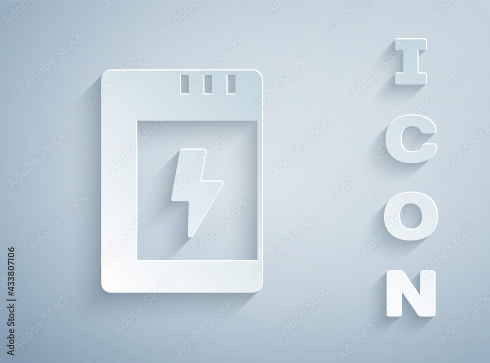 Paper cut Battery for camera icon isolated on grey background. Lightning bolt symbol. Paper art style. Vector Paper cut Battery for camera icon isolated on grey background. Lightning bolt symbol. Paper art style. Vector