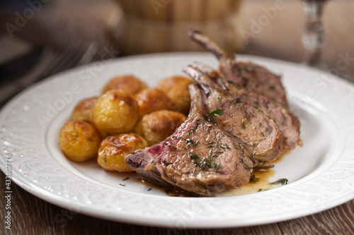 Grilled lamb chops with potatoes. High quality photo.