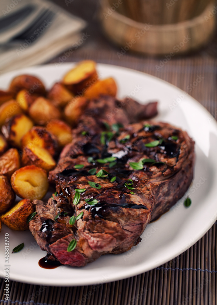 Grilled Beefsteak with Baby Roasted Potatoes. High quality photo.