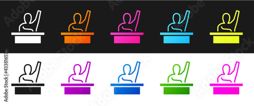 Set Active male kid raising hand answering to teacher question icon isolated on black and white background. An elementary student raises his hand. Vector