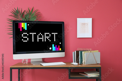 Text START on screen of com...
