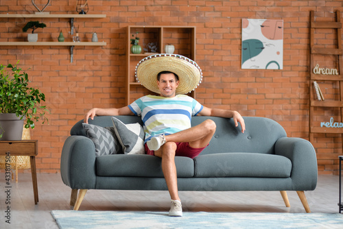 Handsome man with sombrero ...