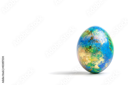 Easter eggs. Easter background. Easter. Copy cpase egg isolated on a white background painted like planet earth, a workpiece for the designer. photo