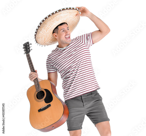 Handsome man in sombrero ha...