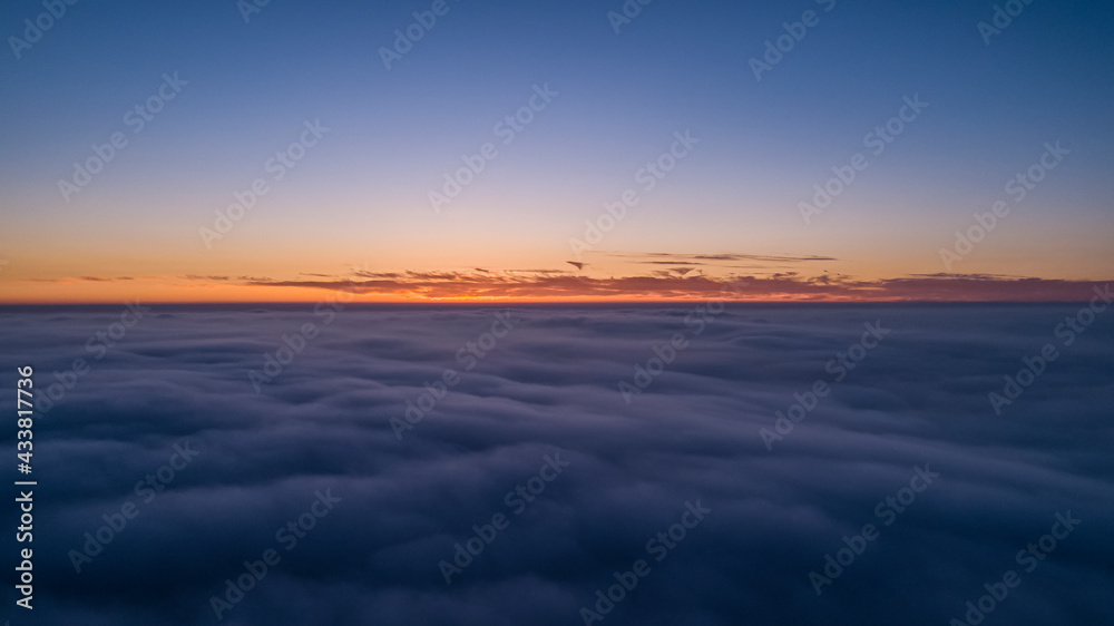 Beautiful sunset above the clouds.