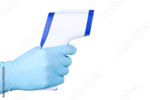 Medical infrared thermometer in doctor hand isolated on white background