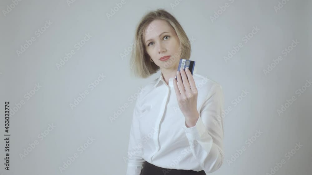 Businesswoman in white encourages you to use a non-cash payment method. 4k video. Businesswoman in white encourages you to use a non-cash payment method. 4k video.