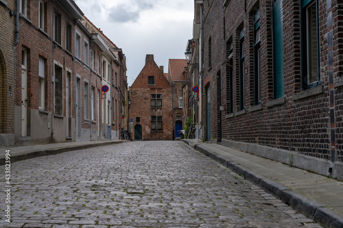 low angle view of typical brick buildings in the historic city center of Bruges