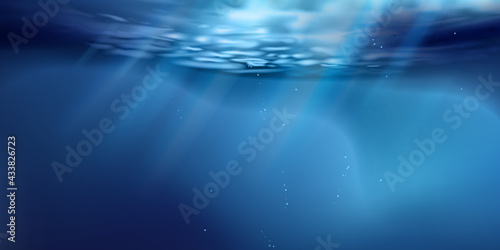 Sea or ocean surface seen from underwater, background. Surface seen from under water. Rays of light, abstract marine backdrop. Nature landscape, beams blurred. Vector illustration. © Nanotrillion