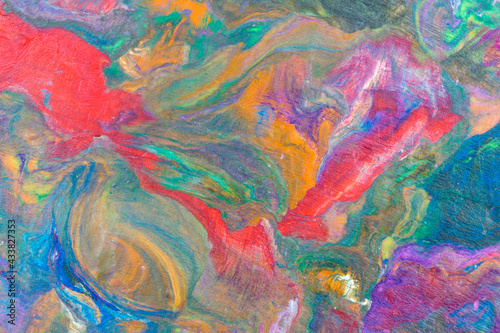 Multicolored pieces of plasticine mixed together to form an abstract background, texture, pattern. 