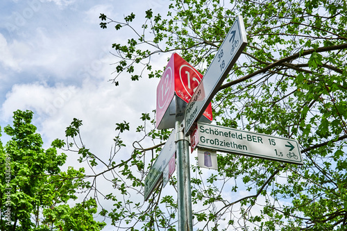 Berlin, Germany - May 15, 2021: Information sign for cyclists on the Berlin Wall Trail between Berlin and Brandenburg with various tourist destinations. photo