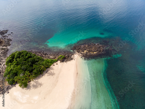 Aerial view of the beach washed by blue ocean water in Indonesia photo