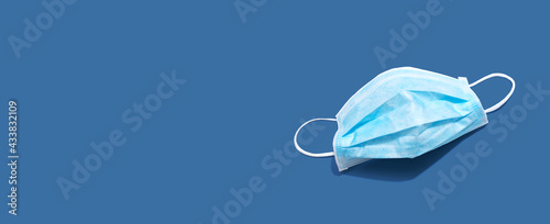 Blue surgical mask overhead view photo