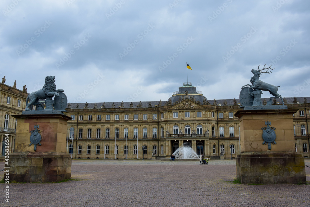 Lion and deer figures on the background of the Palace square with a fountain