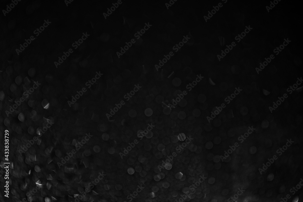 Rain On black background Glass. Background with bokeh. Black and white foto. High quality photo