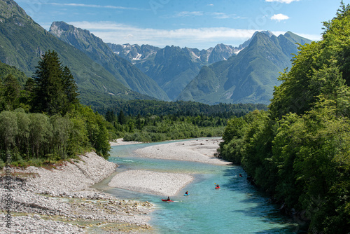 Happy kayakers on the Soča in Slovenia photo