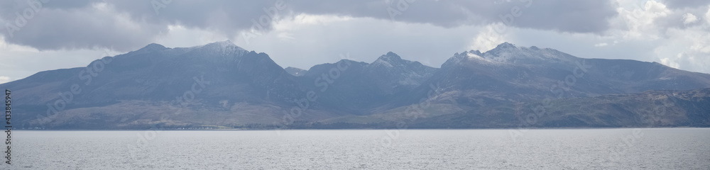 Arran viewed from Rothesay in Isle of Bute under dark clouds