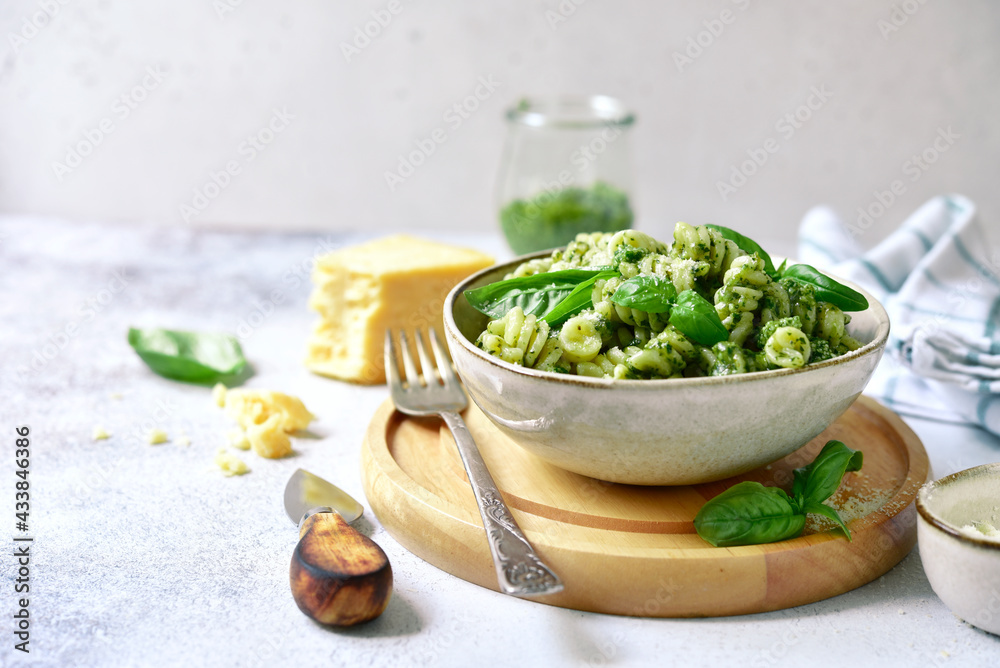 Fusilli pasta with pesto sauce - traditional dish of italian cuisine. Fusilli pasta with pesto sauce - traditional dish of italian cuisine.