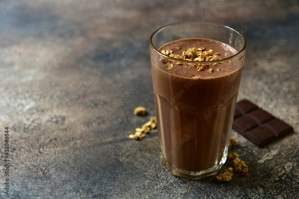 Delicious chocolate smoothie with granola. Delicious chocolate smoothie with granola.