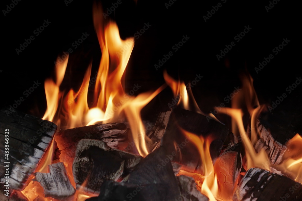 BBQ Grill Pit With Glowing And Flaming Hot Charcoal. Glowing Hot Charcoal In Barbecue Grill Pit With Flames Background Texture, Close-up. Flaming Charcoal In Grill Pit Isolated On Black Background. BBQ Grill Pit With Glowing And Flaming Hot Charcoal. Glowing Hot Charcoal In Barbecue Grill Pit With Flames Background Texture, Close-up. Flaming Charcoal In Grill Pit Isolated On Black Background.