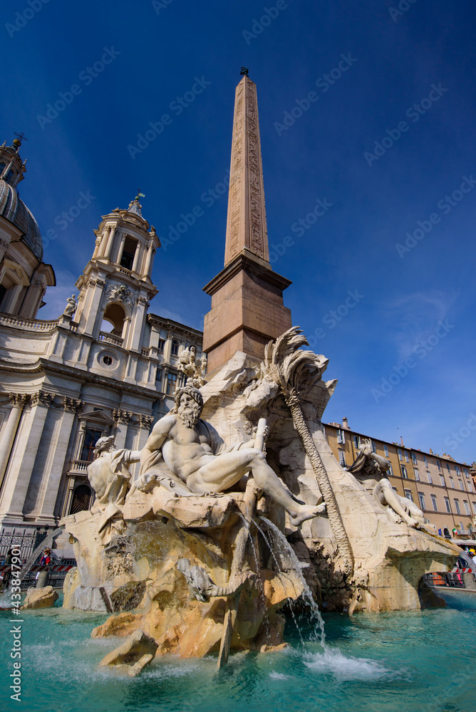 Naklejka premium Fontana dei Quattro Fiumi (Fountain of the Four Rivers) at Piazza Navona in Rome, Italy
