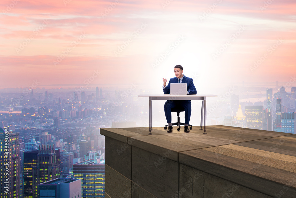 Fototapeta premium Businessman self isolating on the top