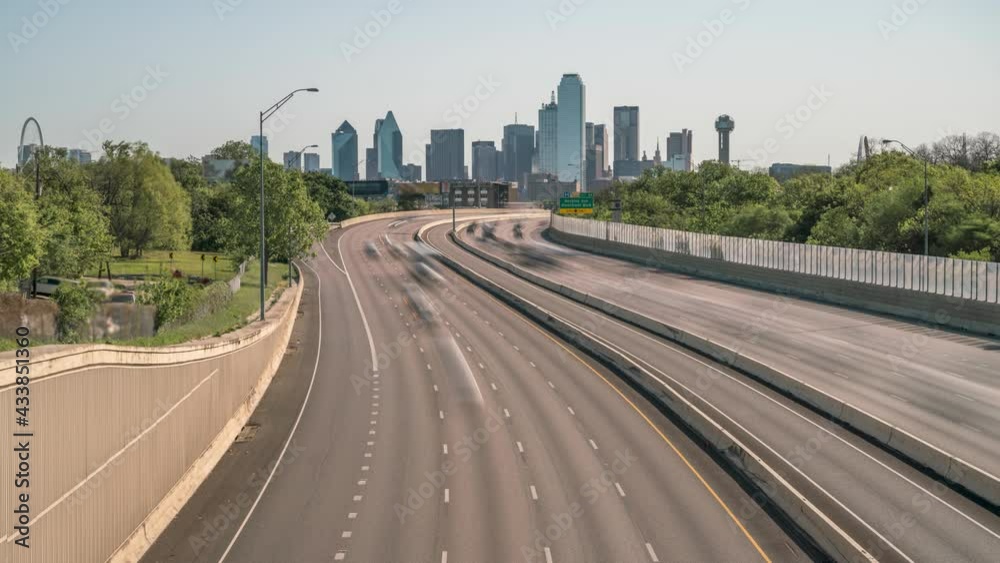 Morning Highway Traffic in Texas with Downtown Dallas Skyline in the Background Morning Highway Traffic in Texas with Downtown Dallas Skyline in the Background