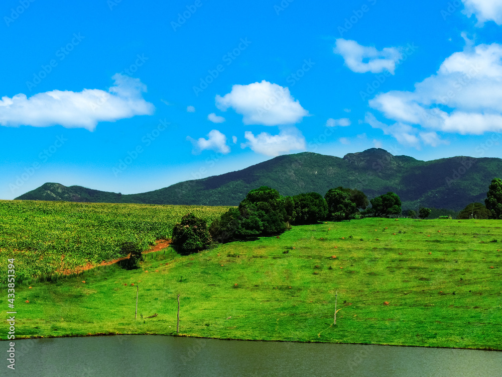 Obraz premium Beautiful high resolution image of the famous Sleeping Giant Mountain located in the touristic city of Joanopolis in Brazil. Stunning photo of the mountain peak that reminds a man lying down.
