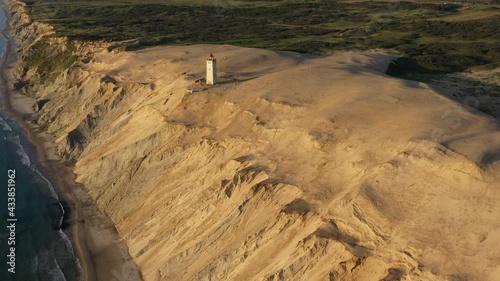 Drone Flight Of Rubjerg Knude Lighthouse, Hjorring, Denmark photo