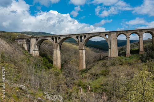 Ancient railway track bridge landscape. Horizontal aerial photography with drone. Concept of life, destiny or direction to follow, thought, reflection, meditation. Selective focus