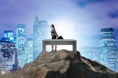 Businesswoman self isolating on the top © Elnur