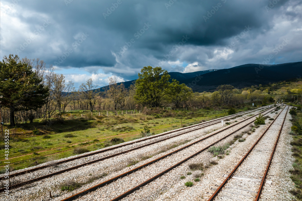 Ancient train tracks landscape. Horizontal aerial photography with drone. Concept of life, destiny or direction to follow, thought, reflection, meditation. Selective focus