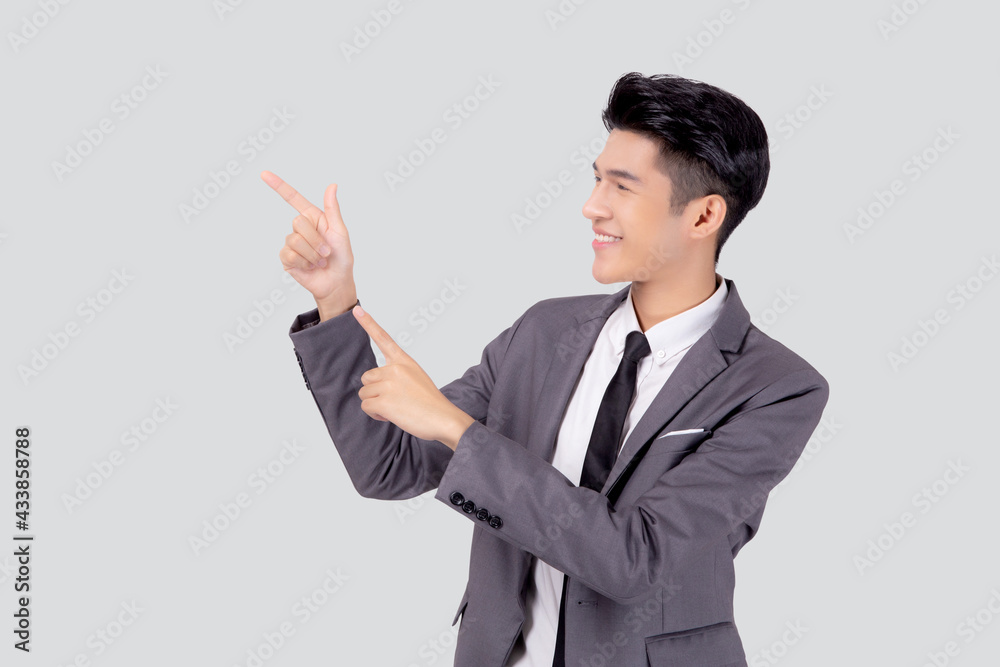 Portrait young asian business man pointing and presenting isolated on white background, advertising and marketing, executive and manager, male confident showing success, expression and emotion. Portrait young asian business man pointing and presenting isolated on white background, advertising and marketing, executive and manager, male confident showing success, expression and emotion.
