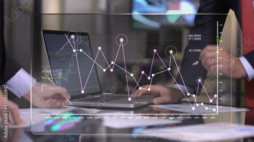 chart in the office with laptop